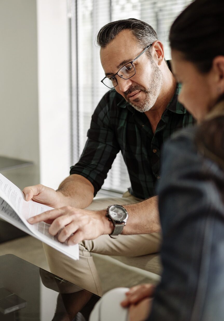 life-insurance-planning financial team reviewing life insurance with member.