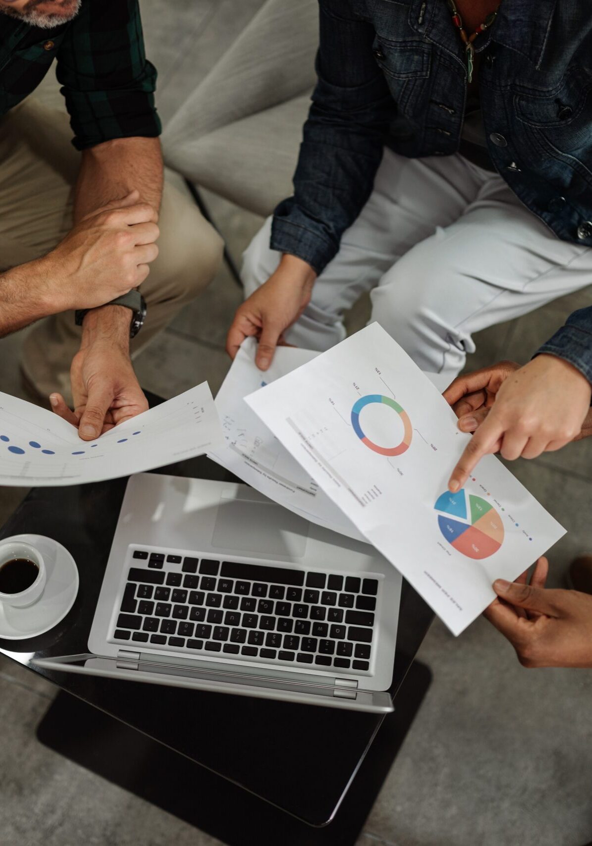 tax-planning-meeting-with-family-legacy-financial-services financial services meeting reviewing tax planning with client.